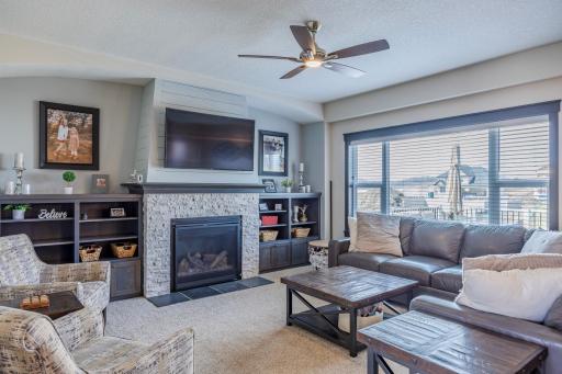 Cozy up by the fireplace and unwind.