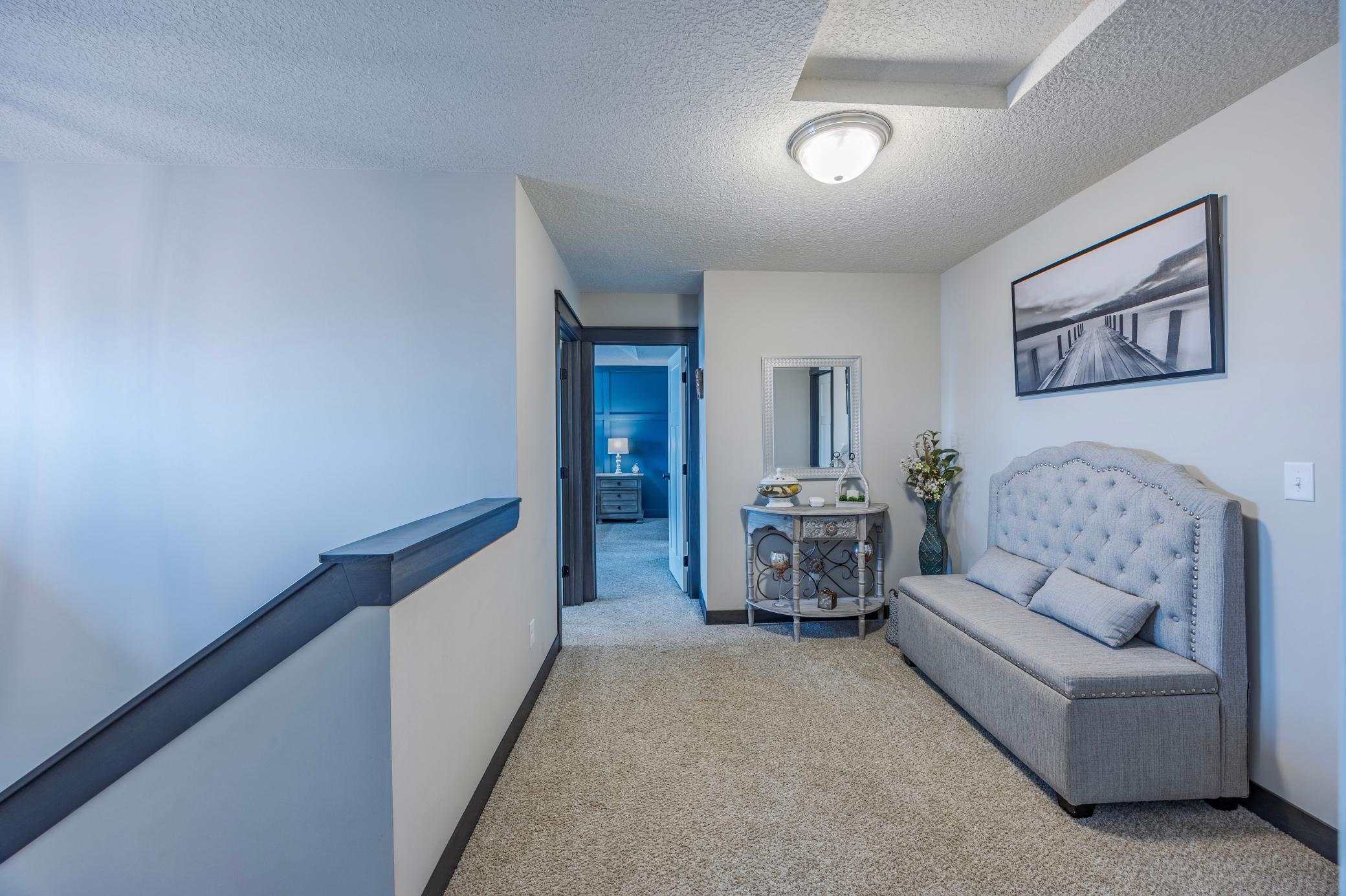 Head upstairs to find all four bedrooms plus a cozy loft.