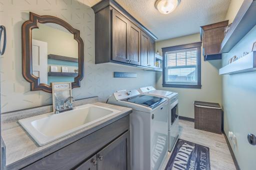 No more hauling laundry up and down stairs. Upper level laundry creates ease and comfort.