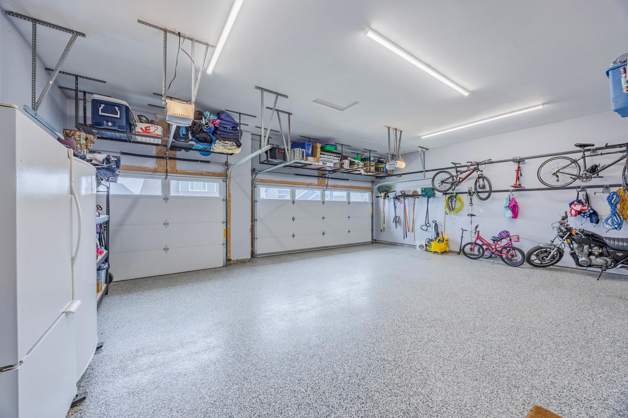 Large 3-stall garage with lots of storage opportunities.