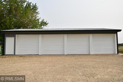 This detached garage is 24 x 42 with four 8 x 9 doors.