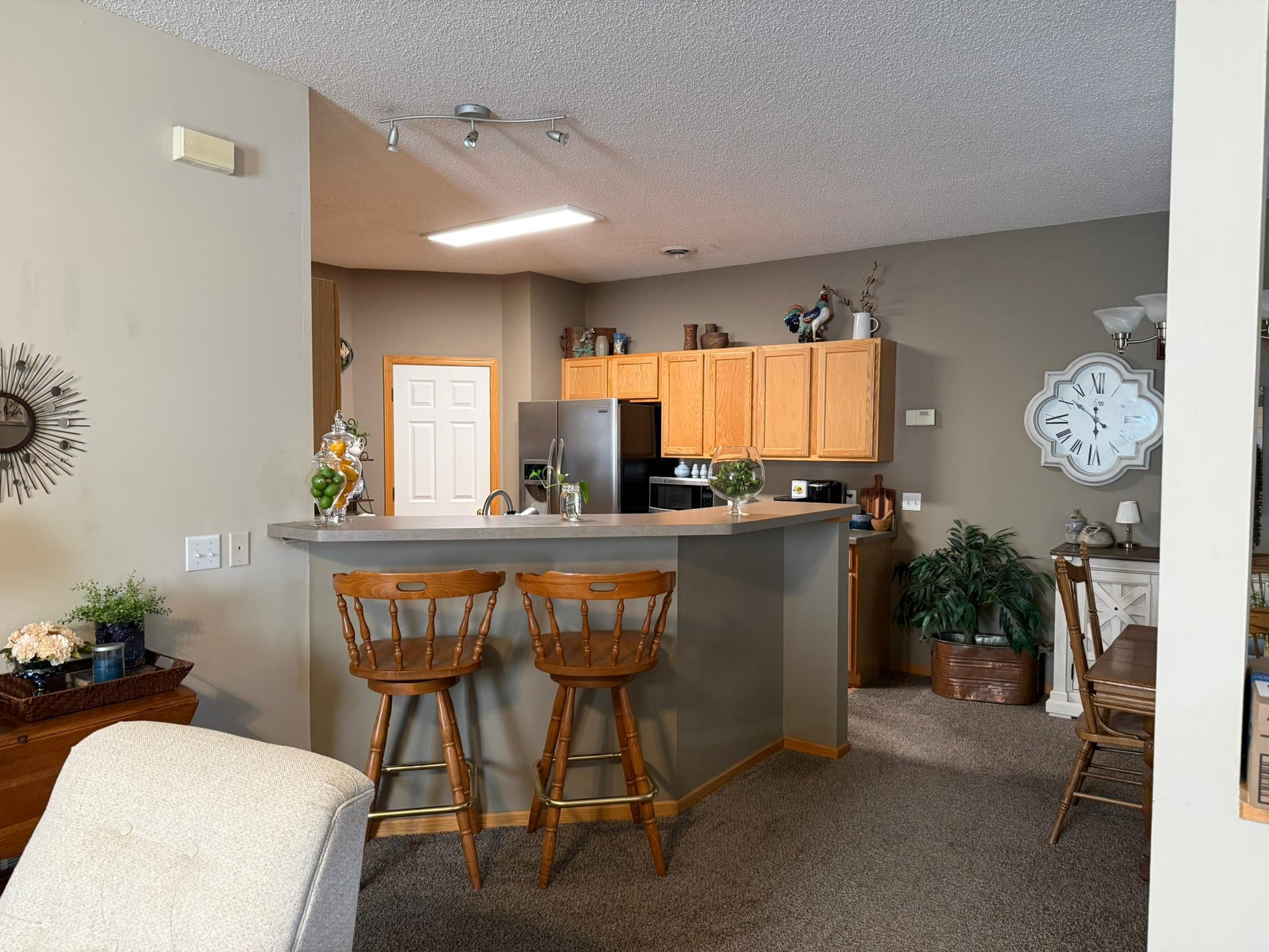 Open concept kitchen with breakfast bar