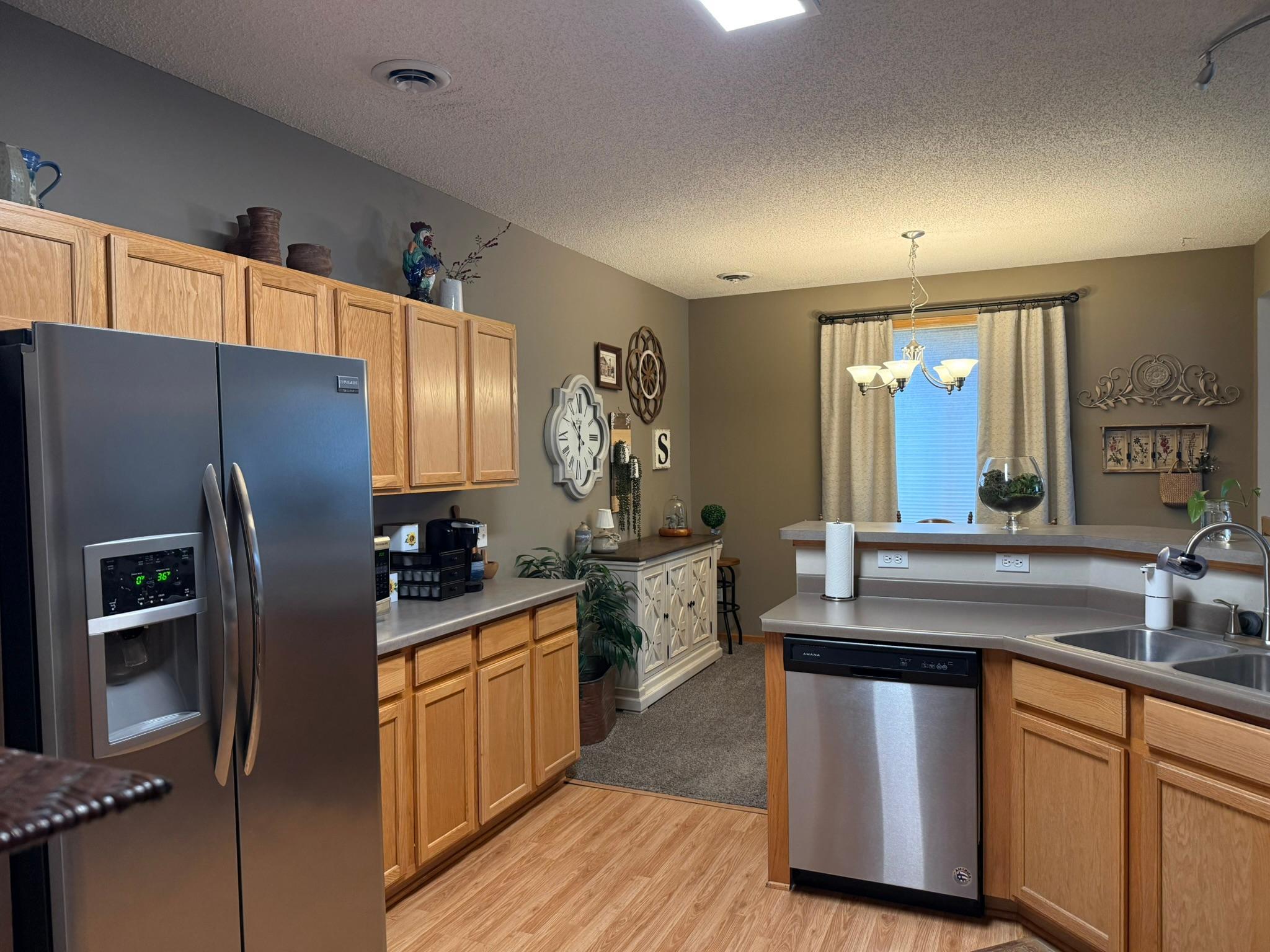 SS appliances and plenty of storage in this kitchenn!
