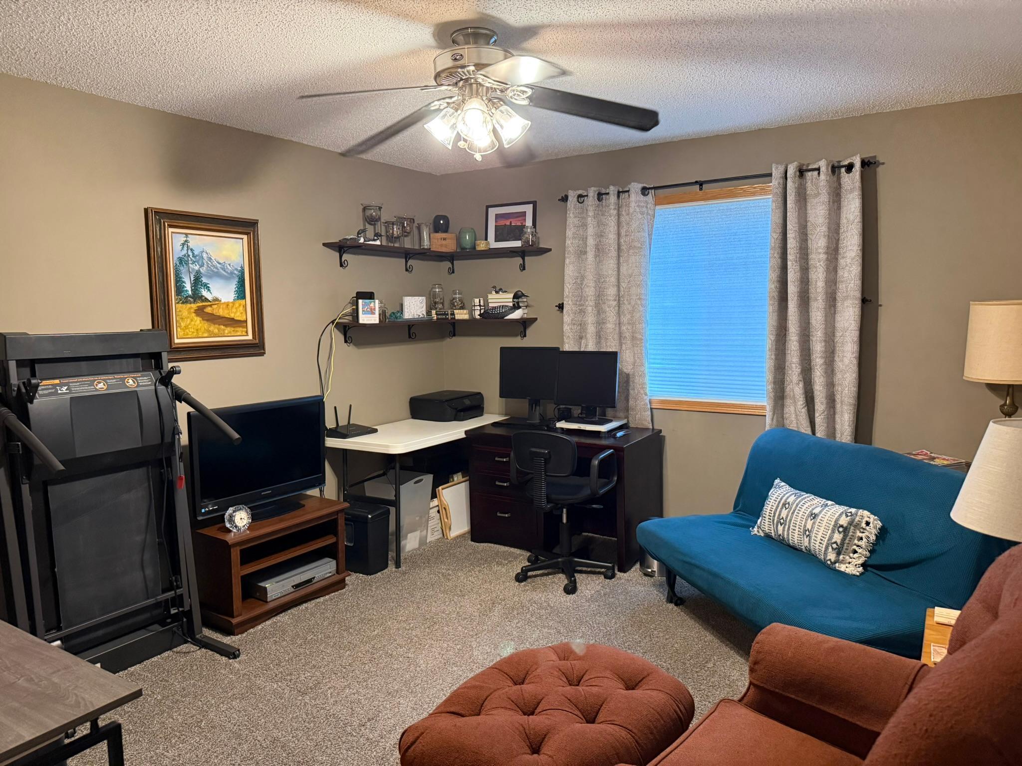 Upper level loft with large window