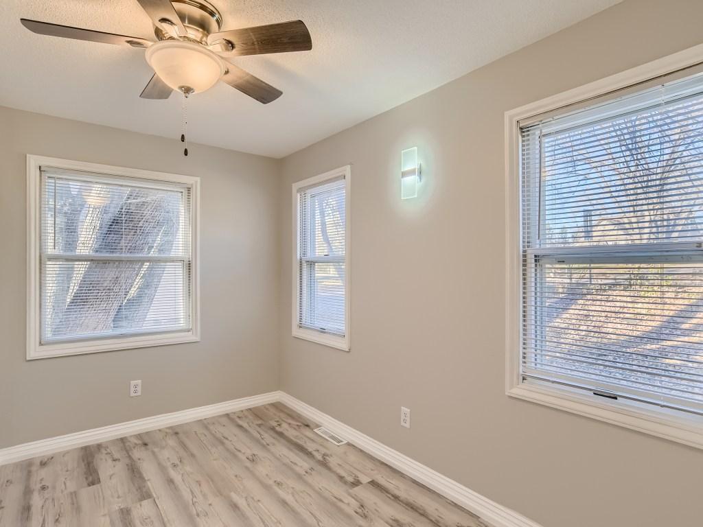 Living room--new paint, flooring & lighting