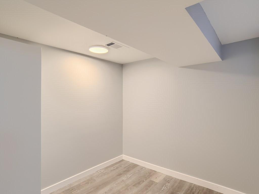 Lower level den or bedroom without an egress window