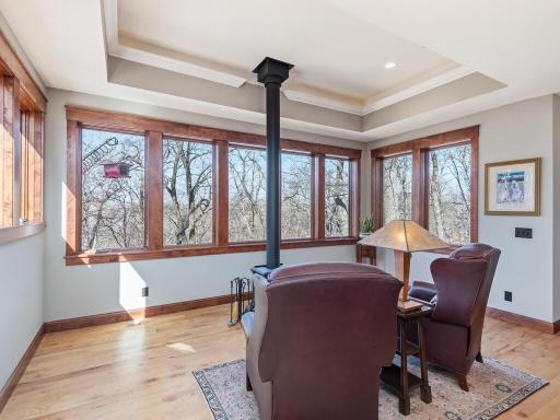 Sun Room area faces west with charming wood burning stove.