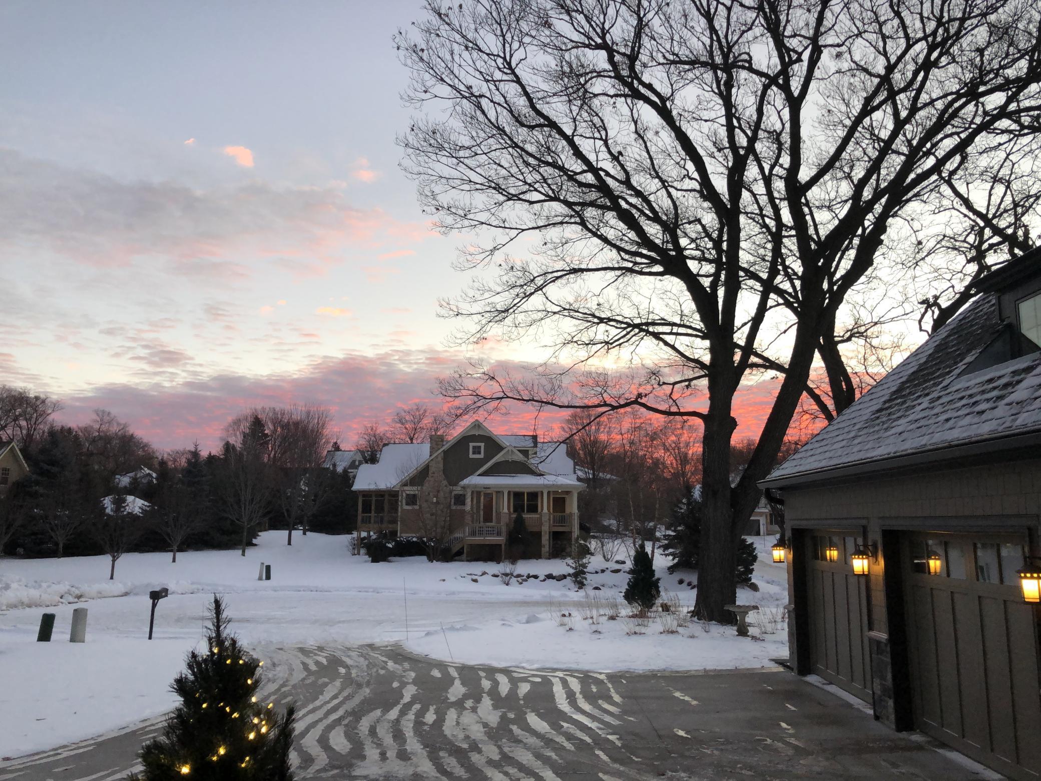 Snow-free driveway and entry all winter with a built-in hydronic snow melt system.