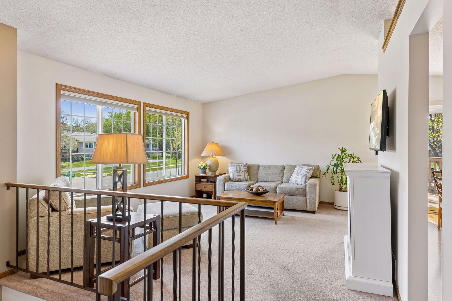Sun-filled living room with vaulted ceiling