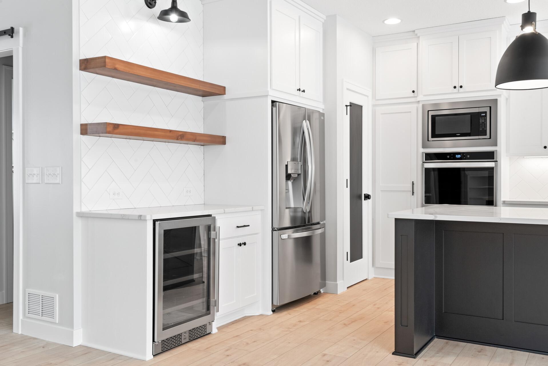 Open Shelving, Wine Cooler, Pantry. Photo of previous home.