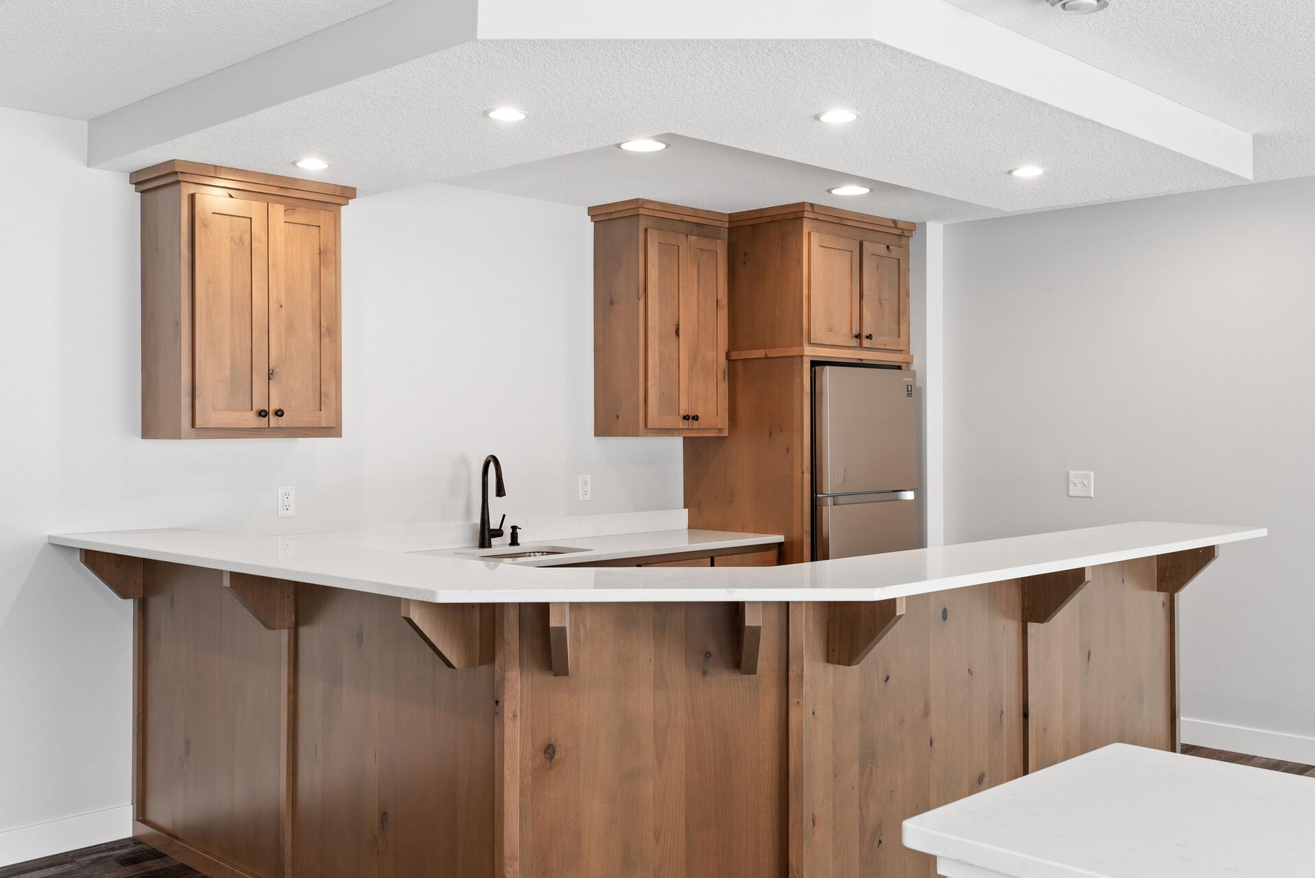 Belly Up around the Wet Bar. Photo of previous home.