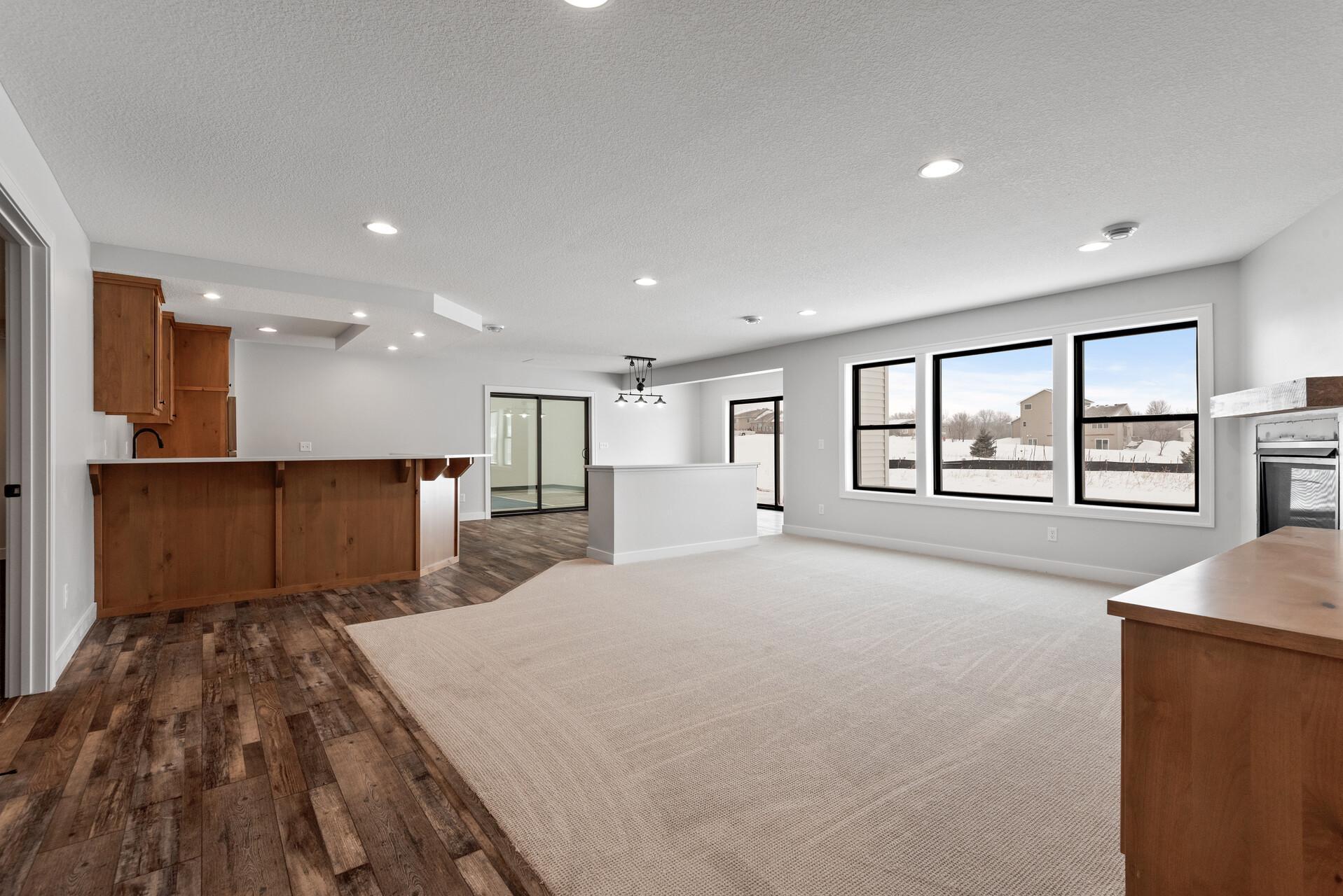 Open Walk-Out Basement with Oversized Windows. Photo of previous home.