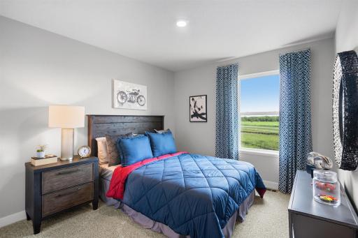 Bedroom # 2 and # 3 upstairs. Model home photo, actual home will vary in finishes.