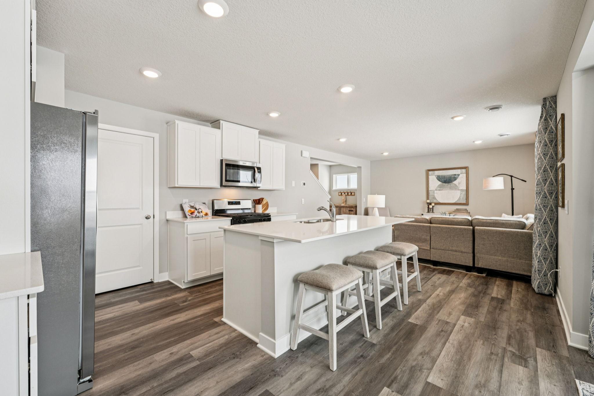 Another view of the Kitchen. Photo of model home, color & options will vary.