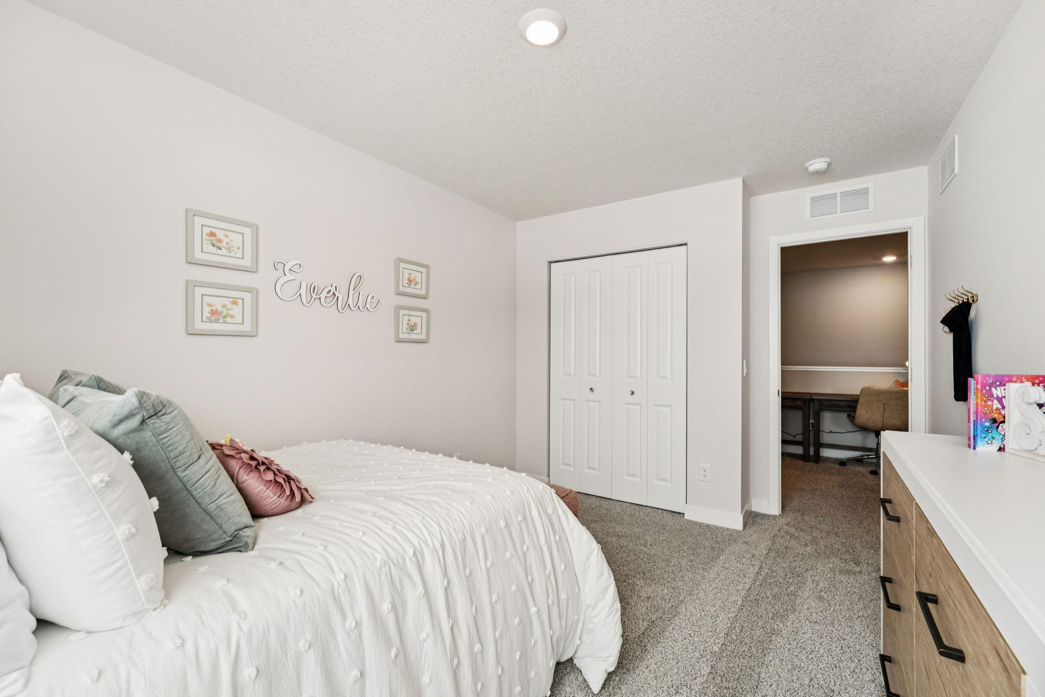 All four bedrooms upstairs are spacious and bright! Photo of model home, color & options will vary.