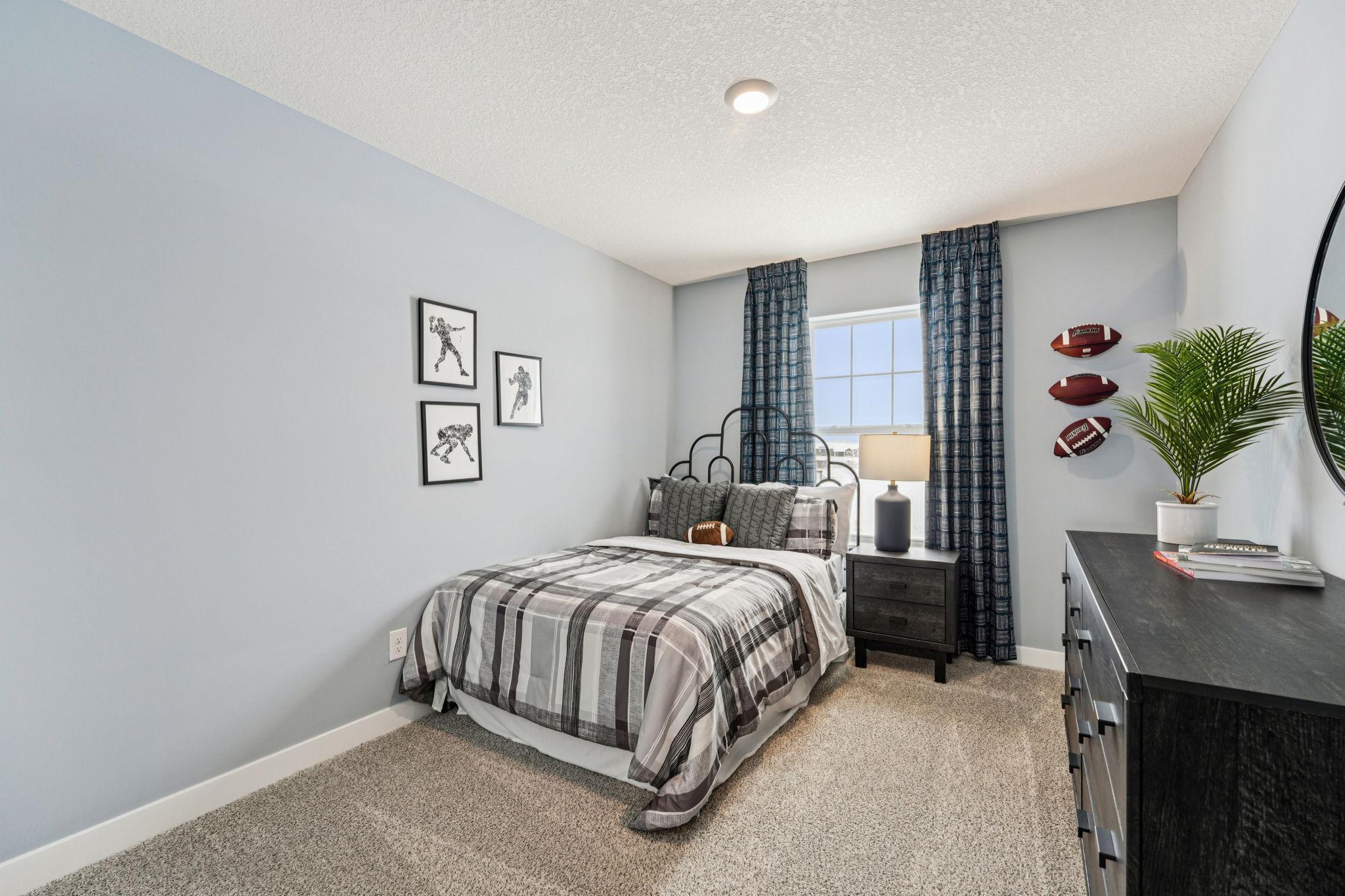 All four bedrooms upstairs are spacious and bright! Photo of model home, color & options will vary.