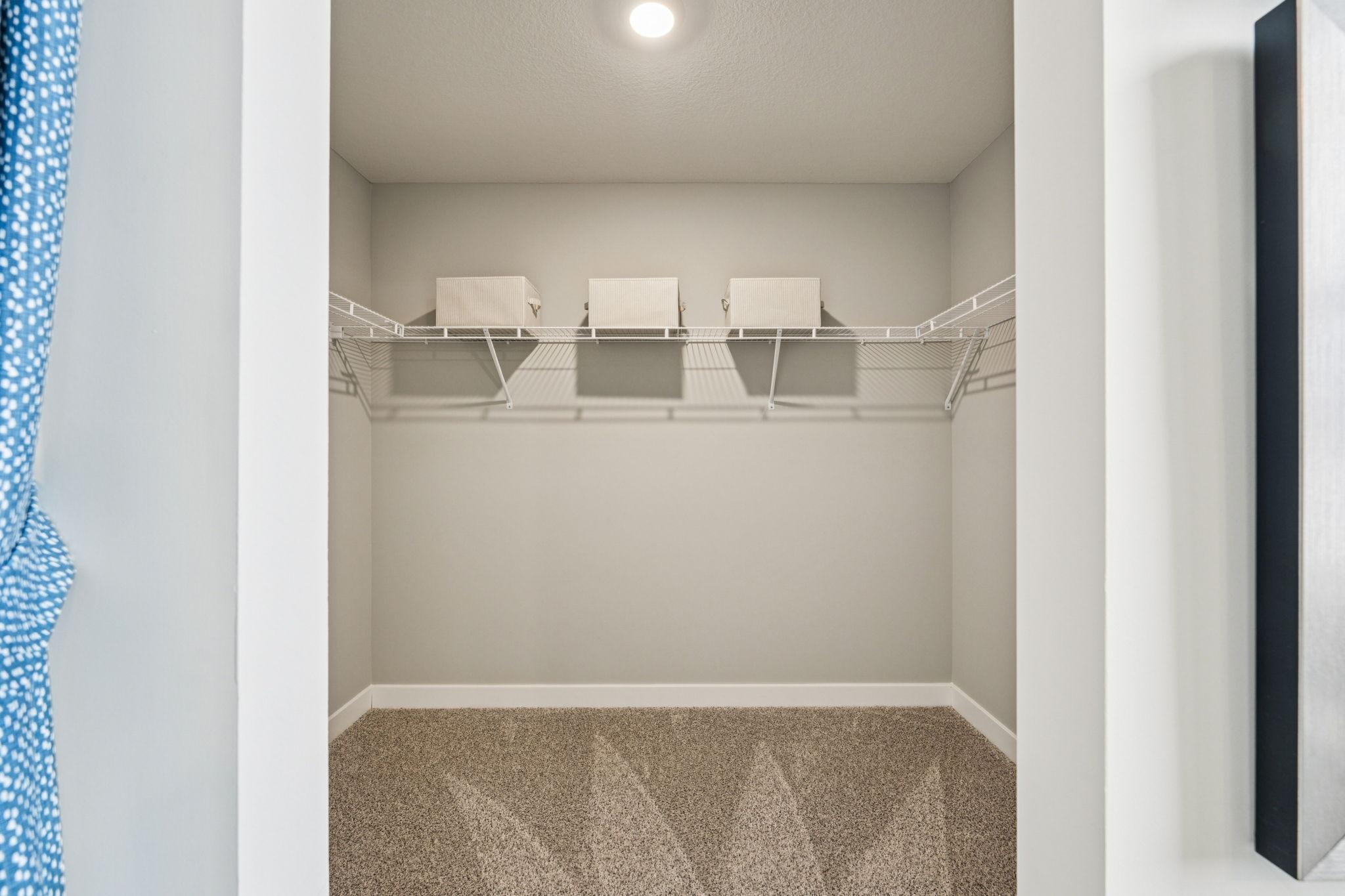 And then there is this walk-in closet, which is huge! Photo of model home, color & options will vary.