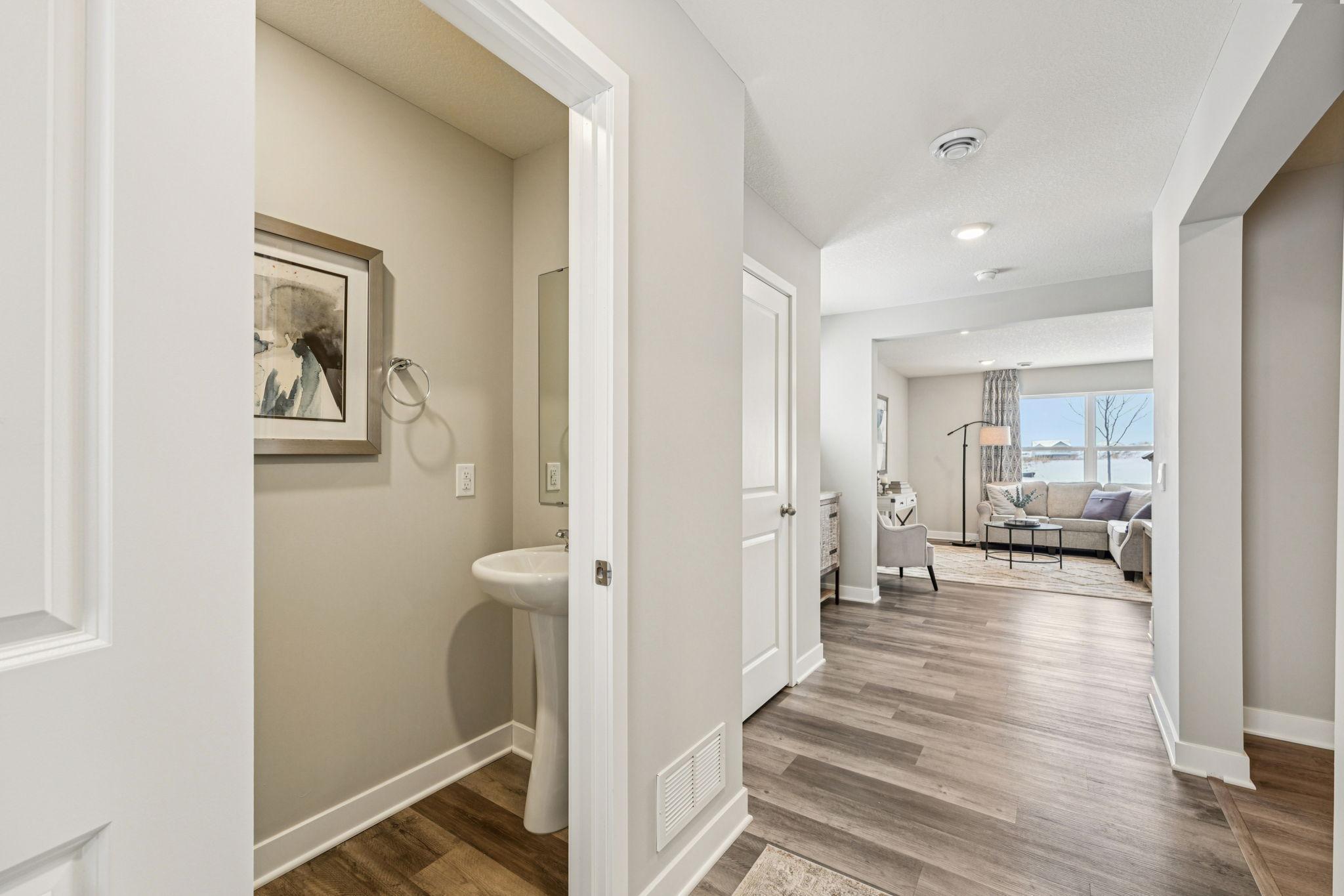 Front foyer with large coat closet. Photo of model home, color & options will vary.
