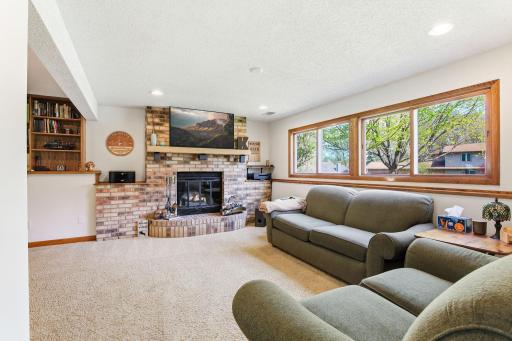 Lower Level Family Room with Wood-burning Fireplace