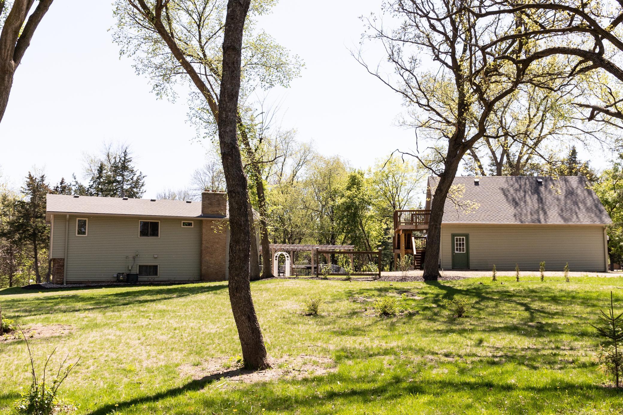 11660 Lehigh Ave S -Hastings - side of house and shop.jpg