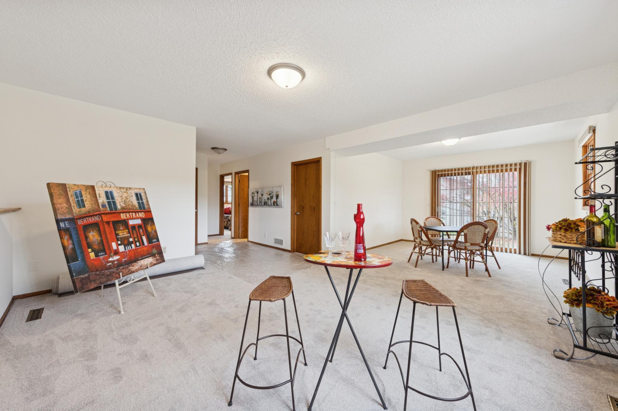 17. Walk-out Level, Grand Family room with multiple areas.jpg