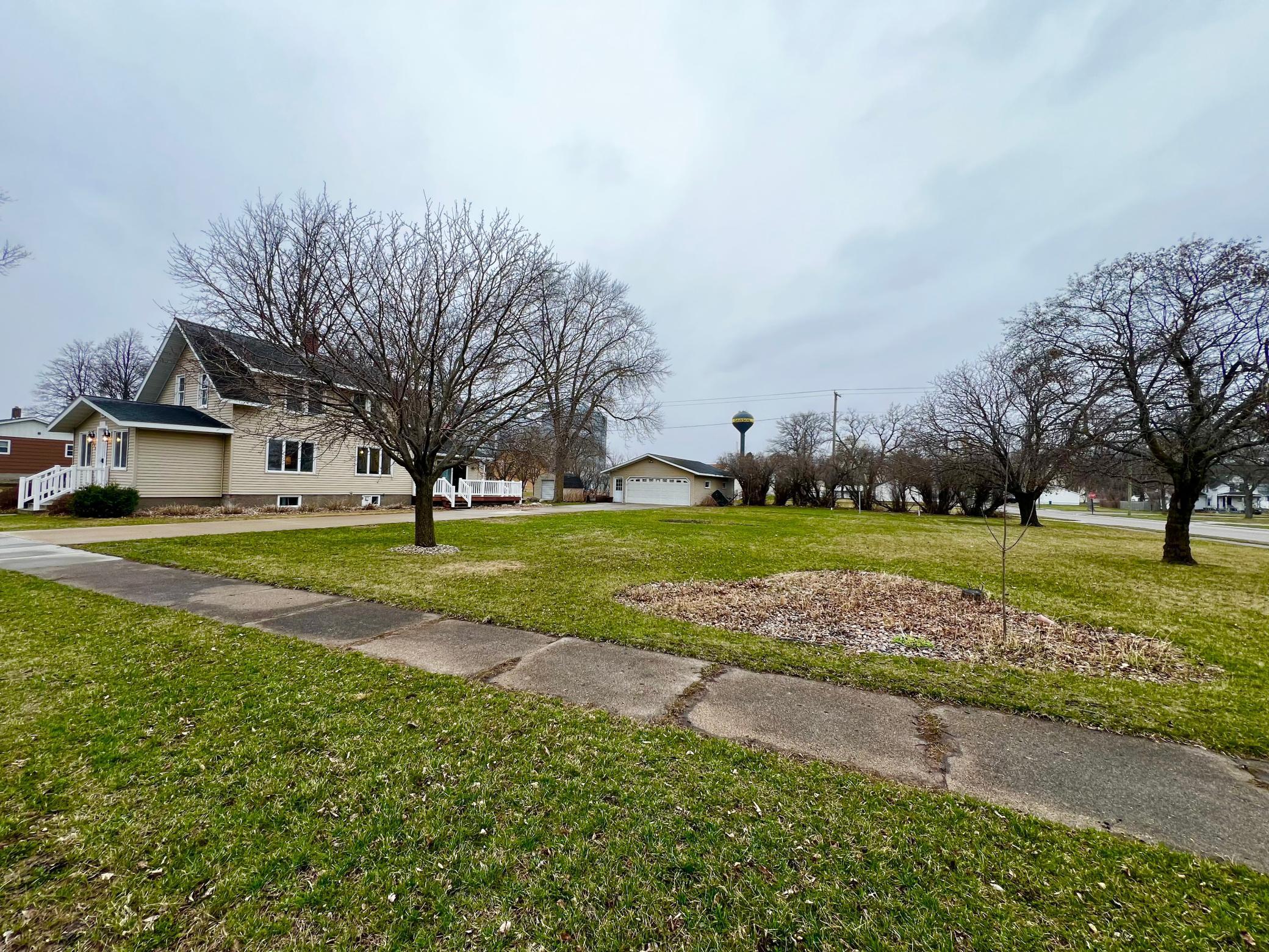 This Home sits on a Corner Lot with a total of 9 Lots within the 2 Parcels!