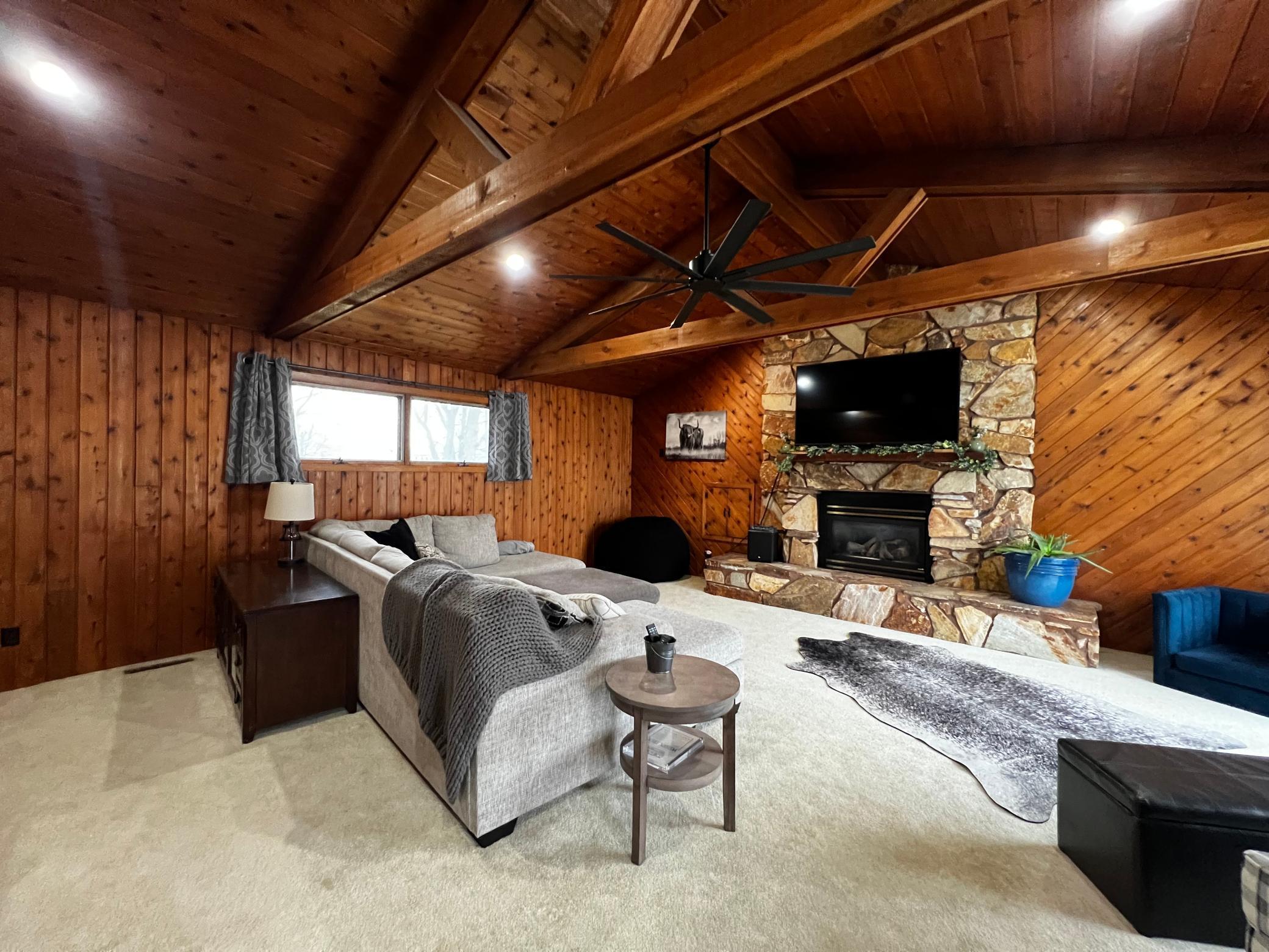 Living Room plenty of room to gather - Vaulted Ceiling, Gorgeous Stone Fireplace!