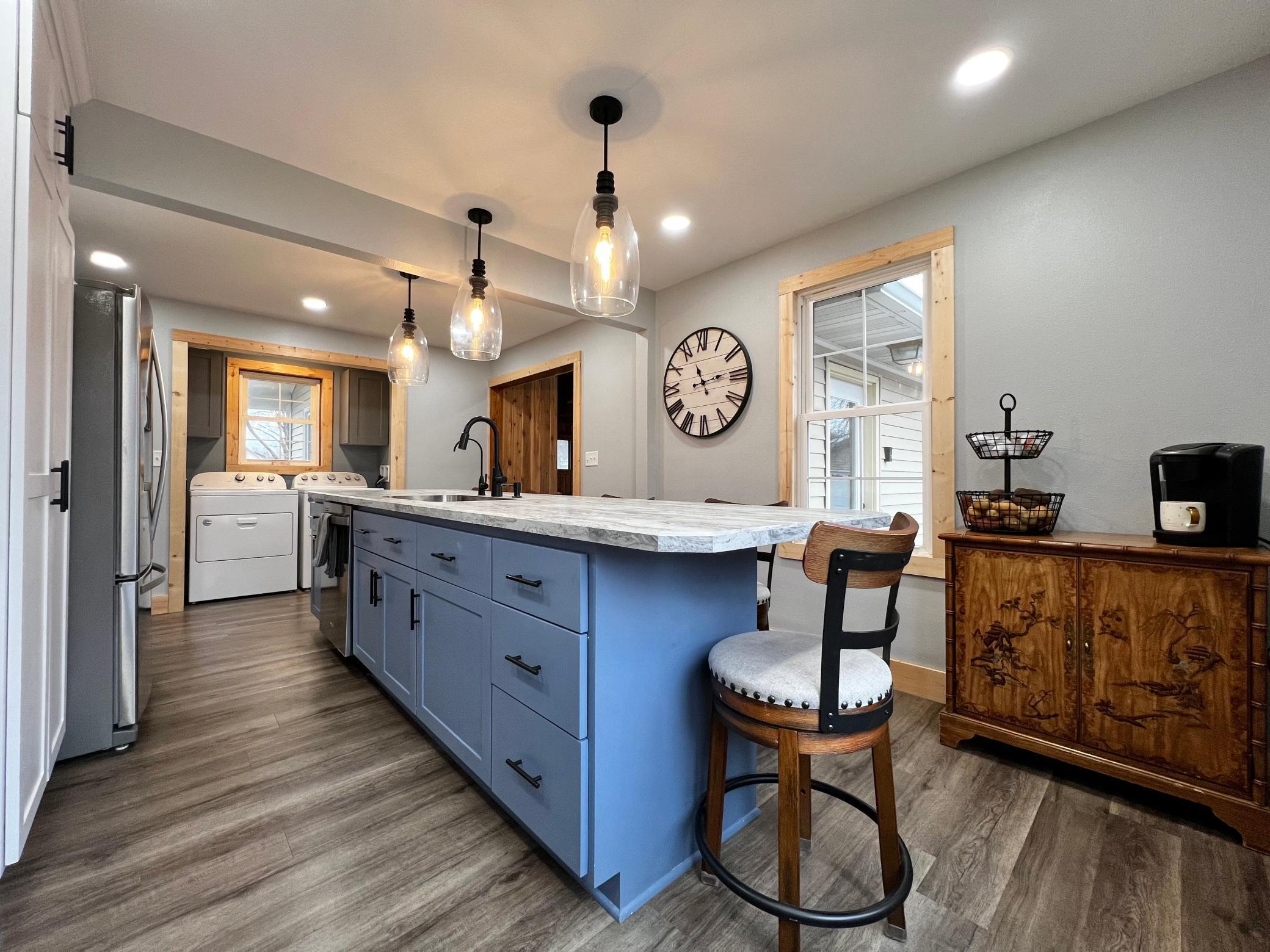 Full view of the Kitchen to the Laundry Closet.
