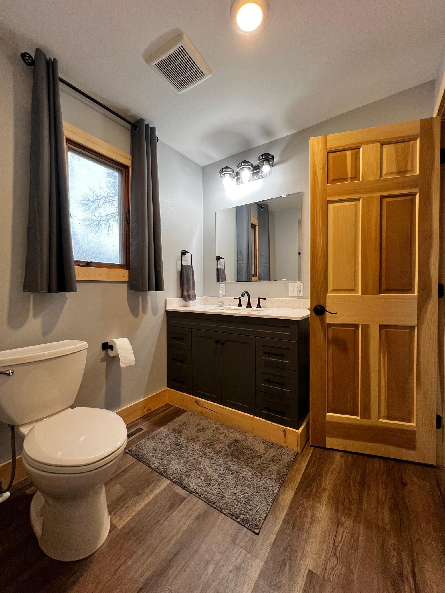 Main Floor Full Bathroom view with New Vanity.