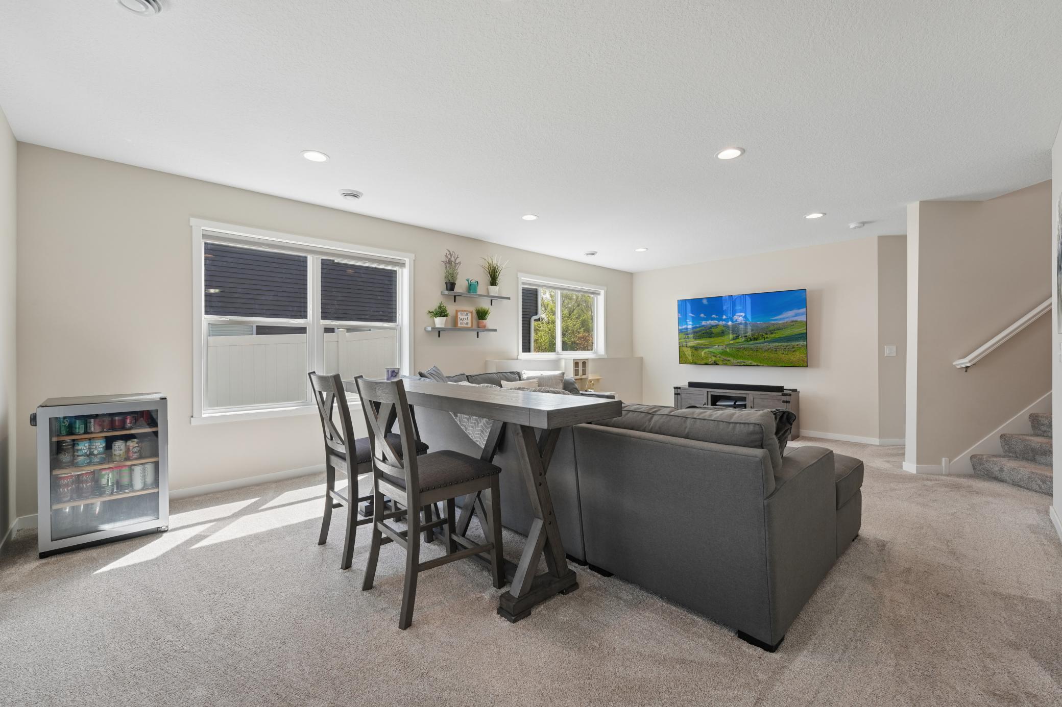 The lower level family room provides great space to host company