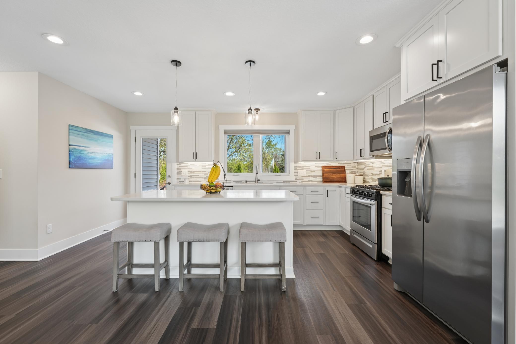 Door to deck allows for easy grilling and outdoor entertaining
