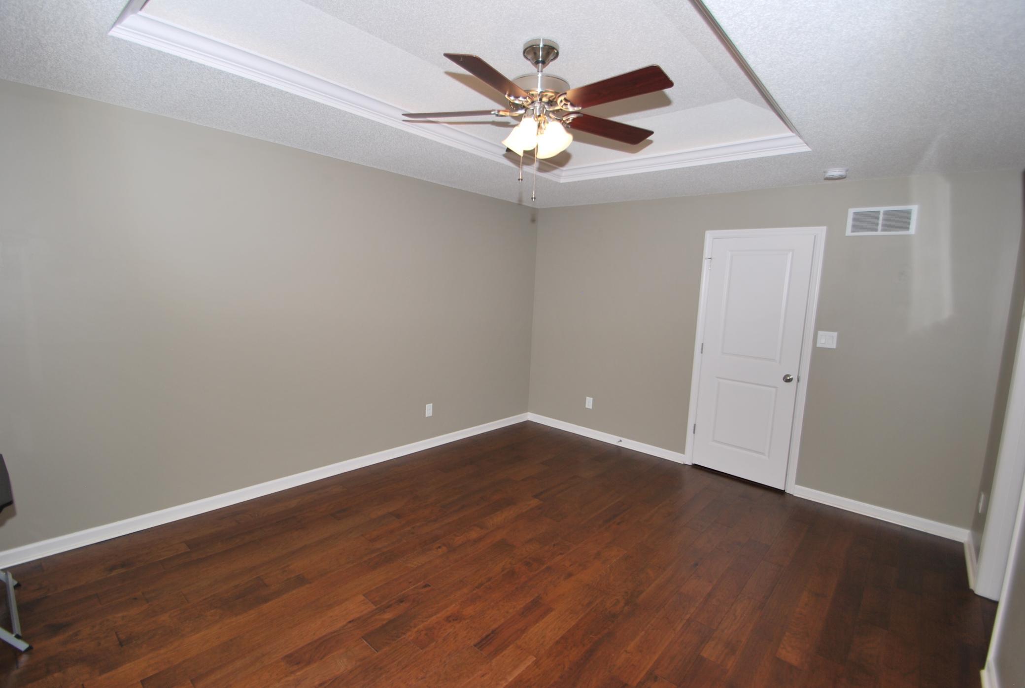 Primary bedroom - notice the detail in the ceiling
