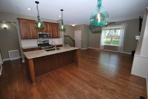 A view towards the front door and large living room space