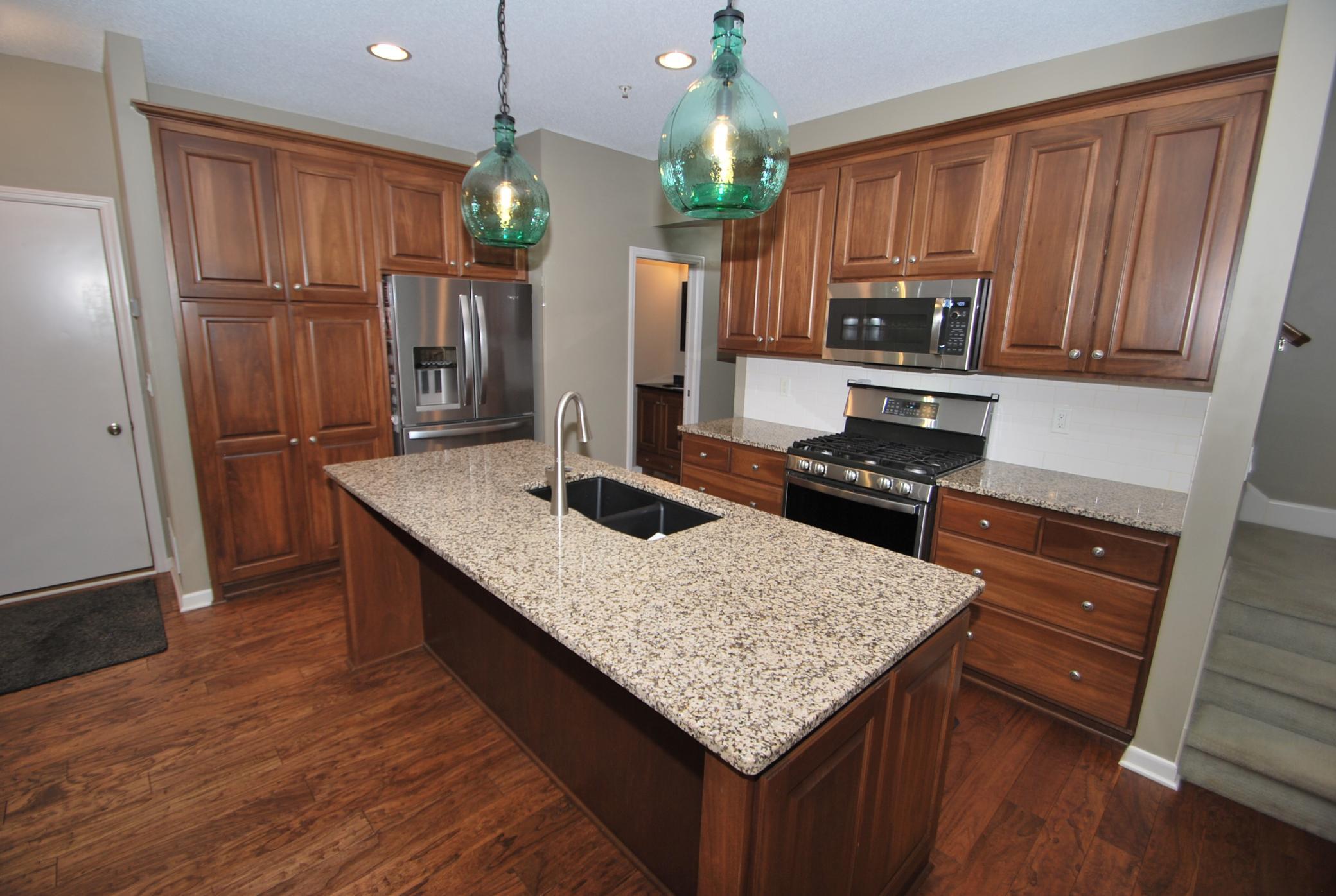 This kitchen is a 10! Updated appliances, ample storage and island seating