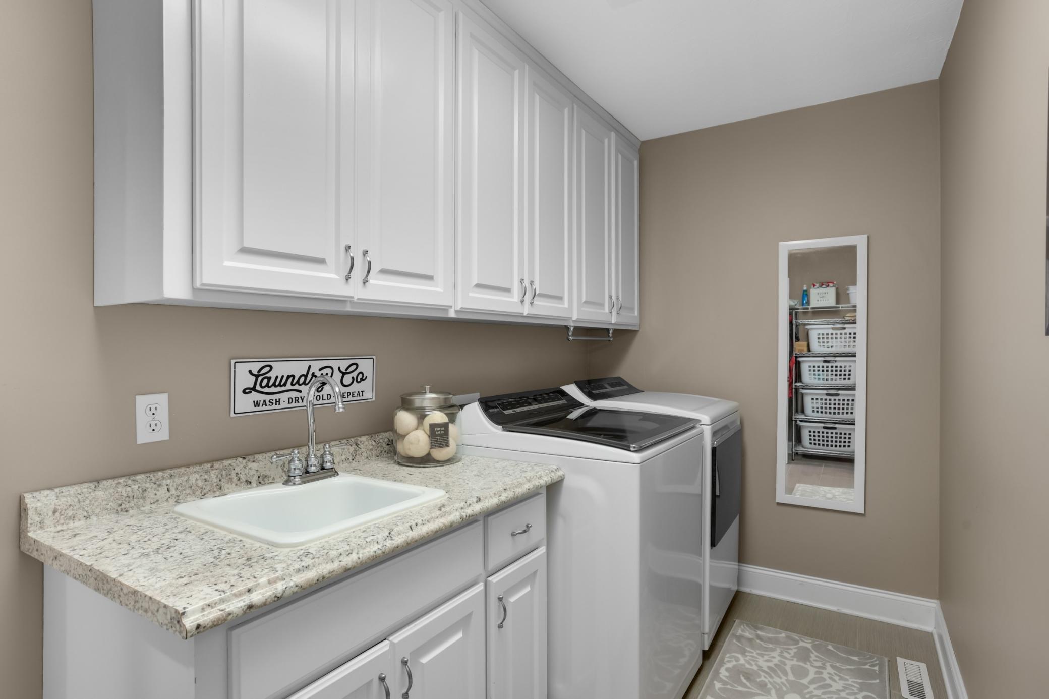 Upper-level laundry for ultimate convenience.
