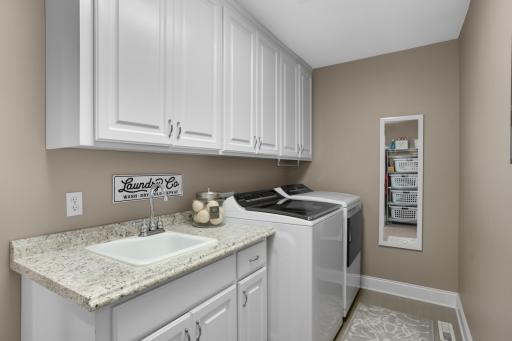 Upper-level laundry for ultimate convenience.