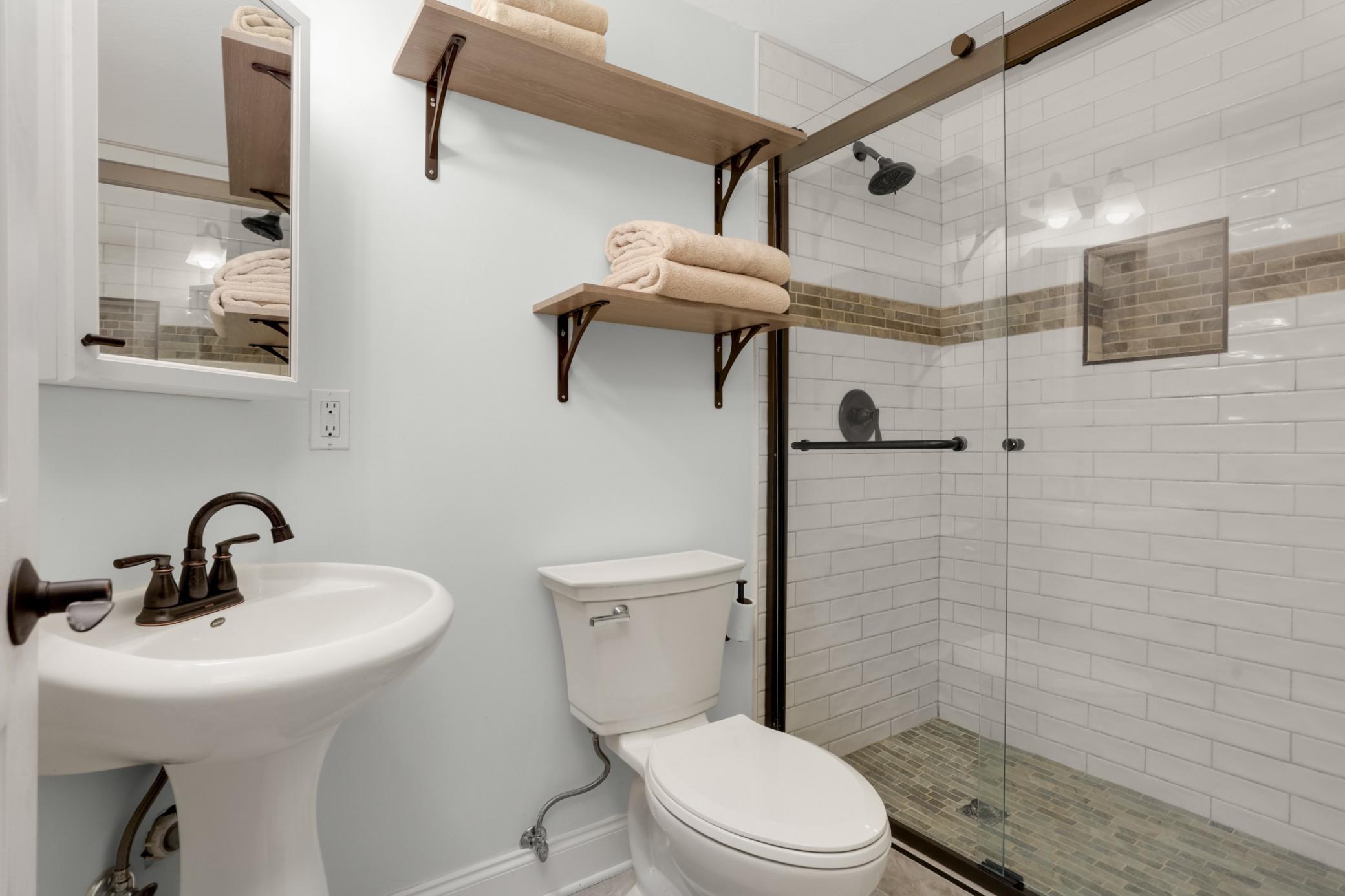Stunning lower-level ¾ bath.