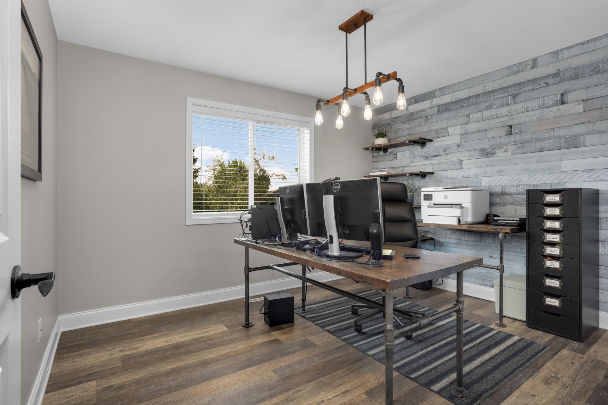 Third upper-level bedroom offers the perfect space for a home office.