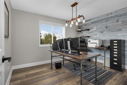 Third upper-level bedroom offers the perfect space for a home office.