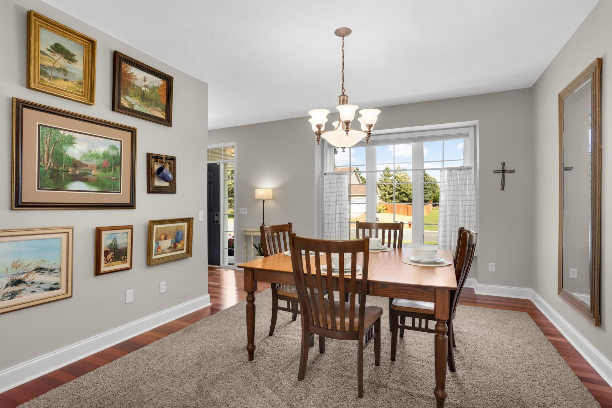 Natural light floods this charming space.