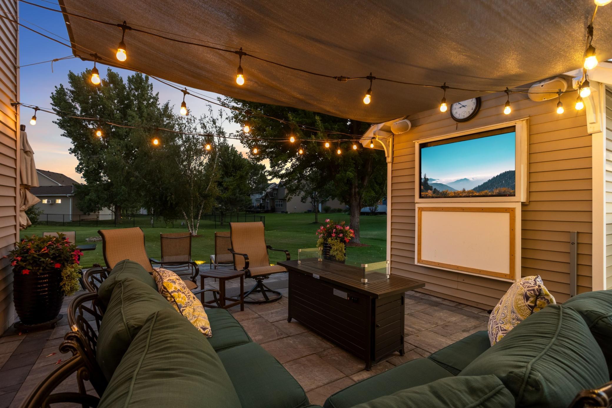 Cozy patio. Big-screen nights, under the stars.