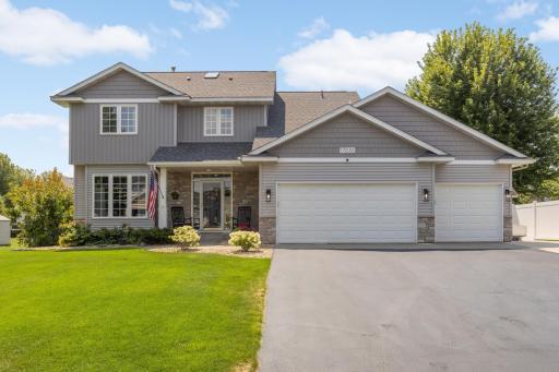 Photo for 17030 Fairmeadow Way, Farmington, MN 55024 - listing #7053620 Front porch + peaked rooflines + 3-car garage + stone accents = timeless charm.