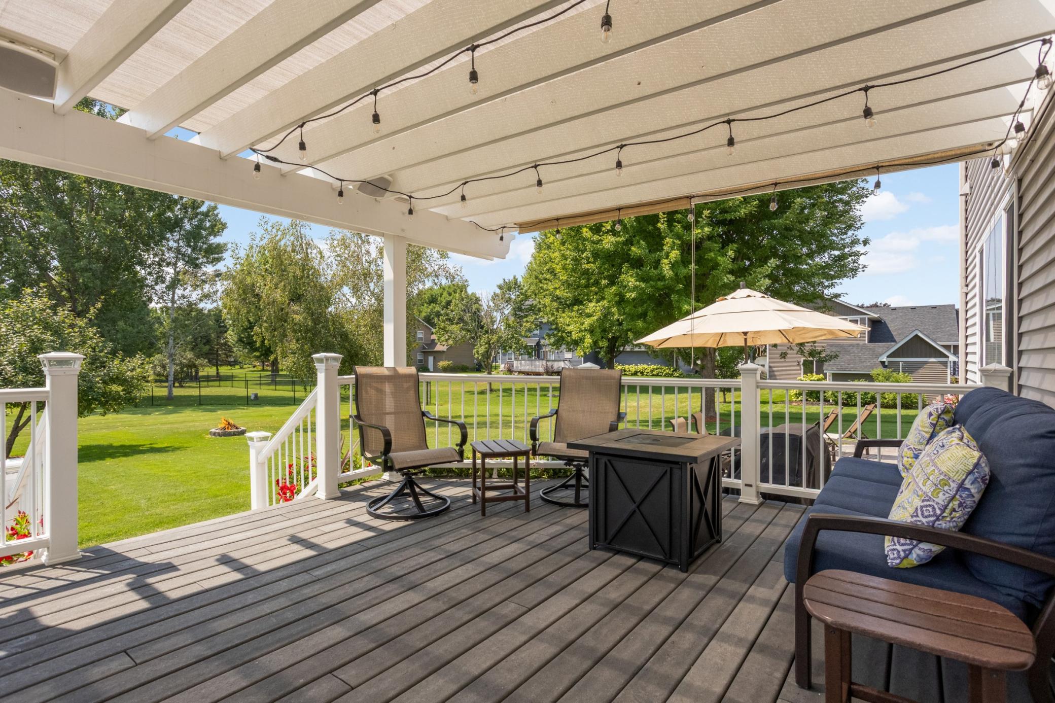 Gorgeous Trex deck with composite rails & pergola, right off the kitchen.