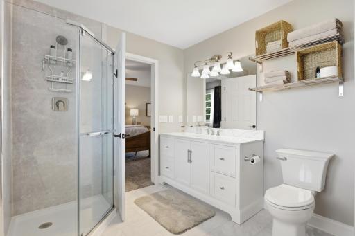 Thoughtfully designed tiled corner shower.