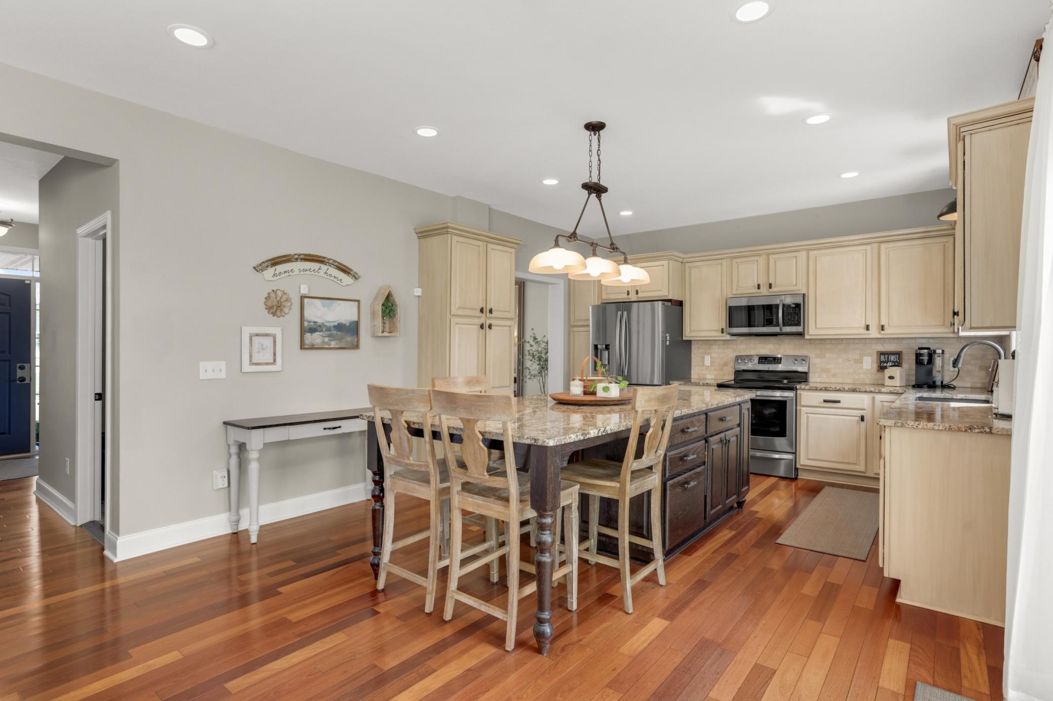 Eat-in gourmet kitchen with breakfast bar—the heart of the home.