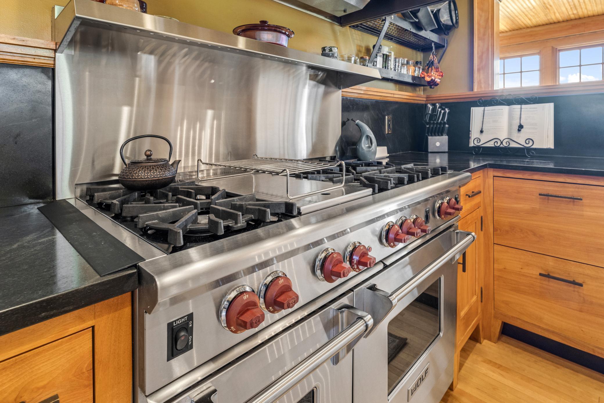 A chef’s dream kitchen with abundant cabinetry, designed for both effortless cooking and stylish entertaining.