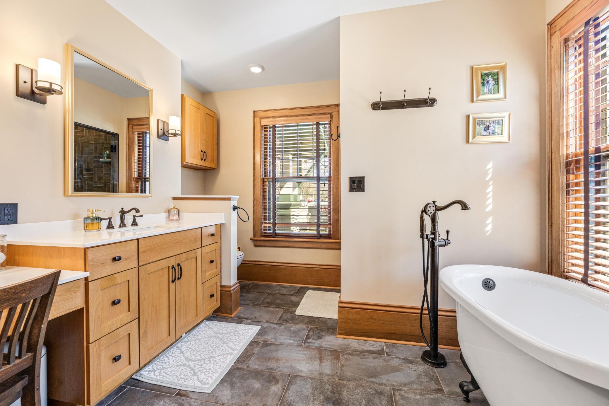 spa-like bath featuring a soaking tub and walk-in shower