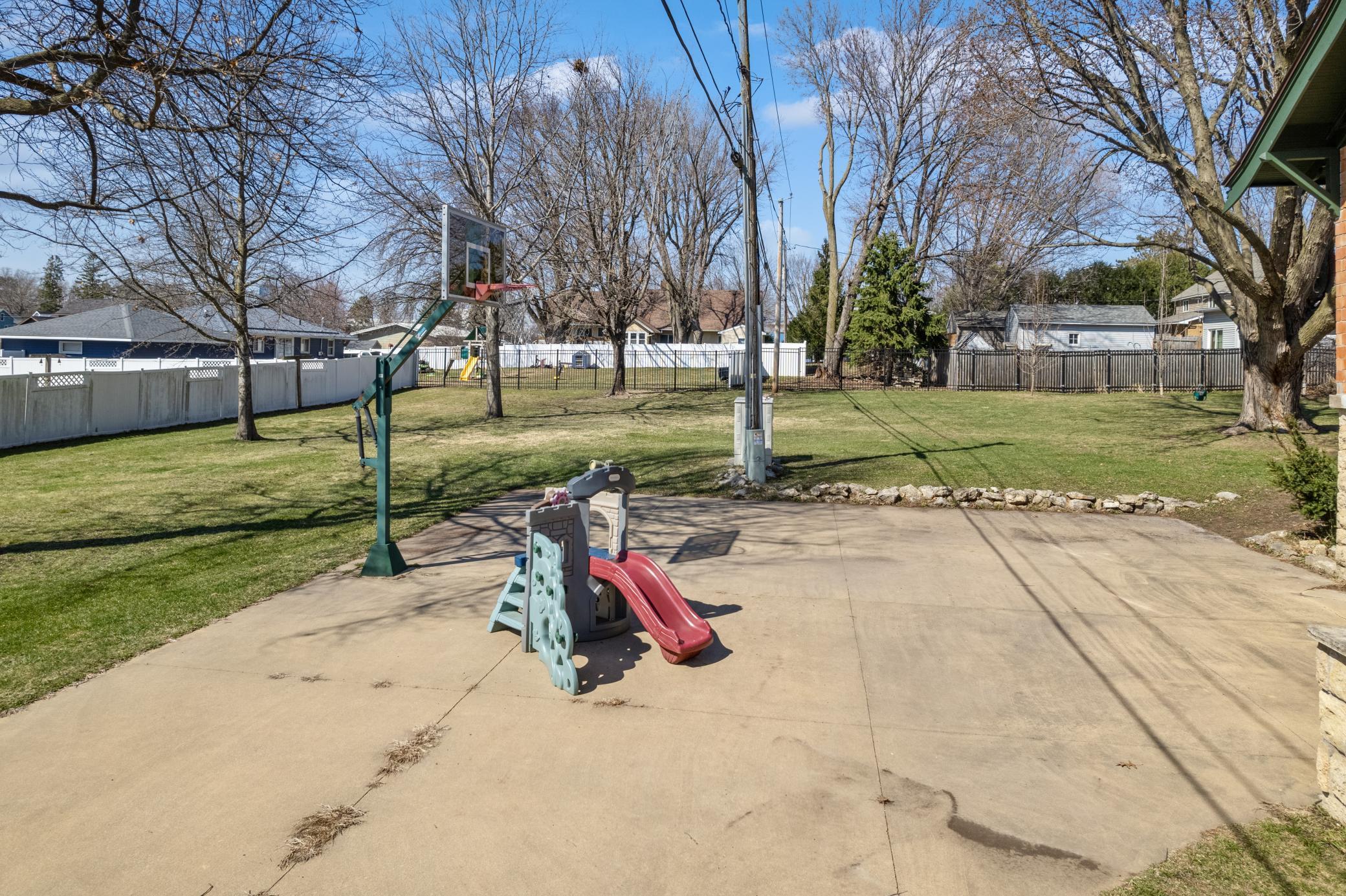 Private backyard basketball court designed for endless fun and friendly competition.