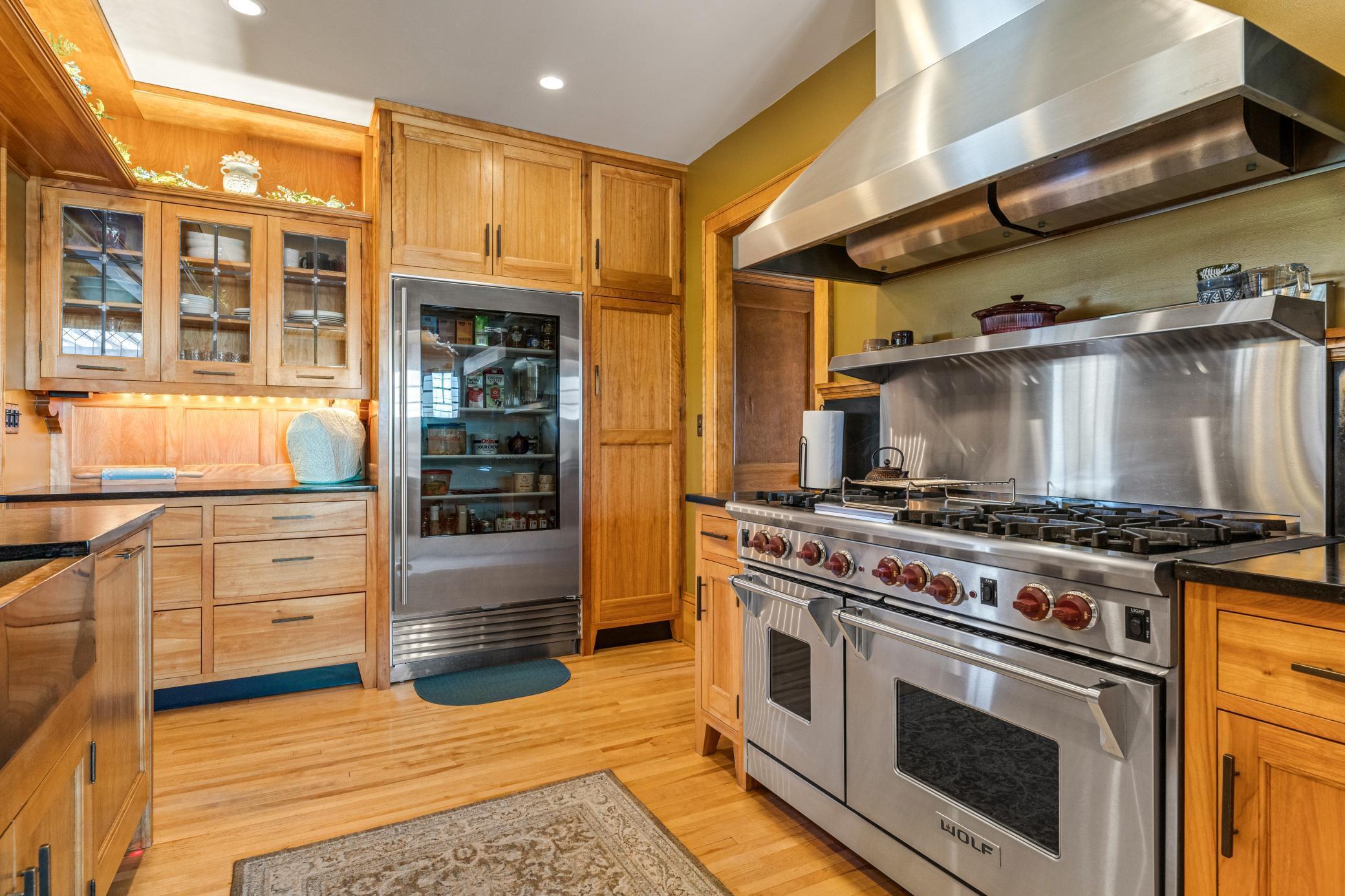 Sleek, luxury column refrigeration blends seamlessly into custom cabinetry for a truly high-end, integrated look.