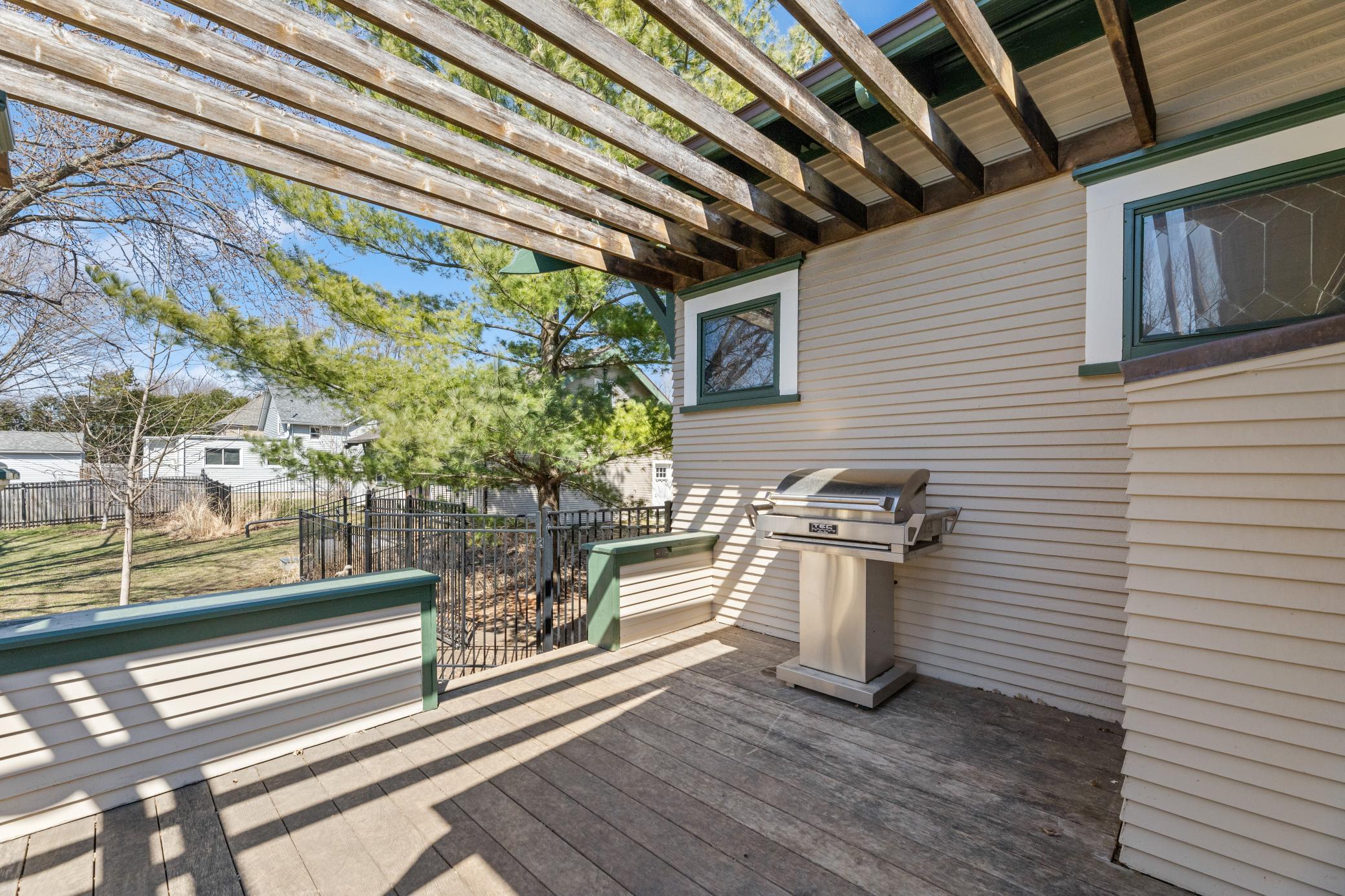 deck perfect for relaxing, entertaining, and taking in peaceful views in every season.